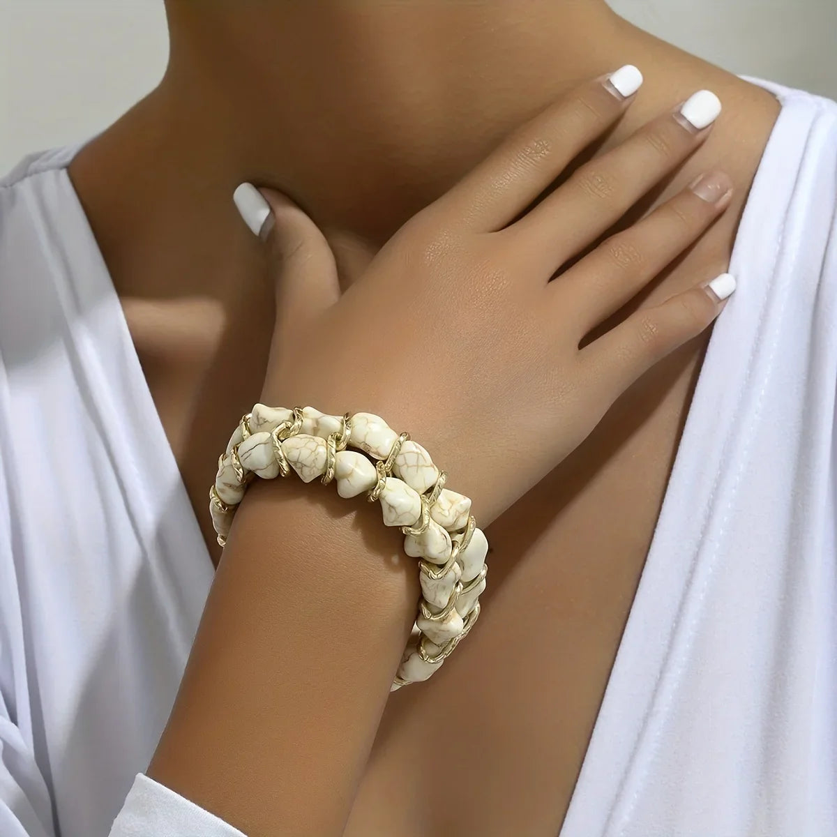 Gewebtes goldenes Armband mit Türkis