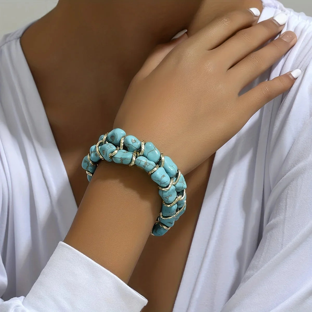 Gewebtes goldenes Armband mit Türkis