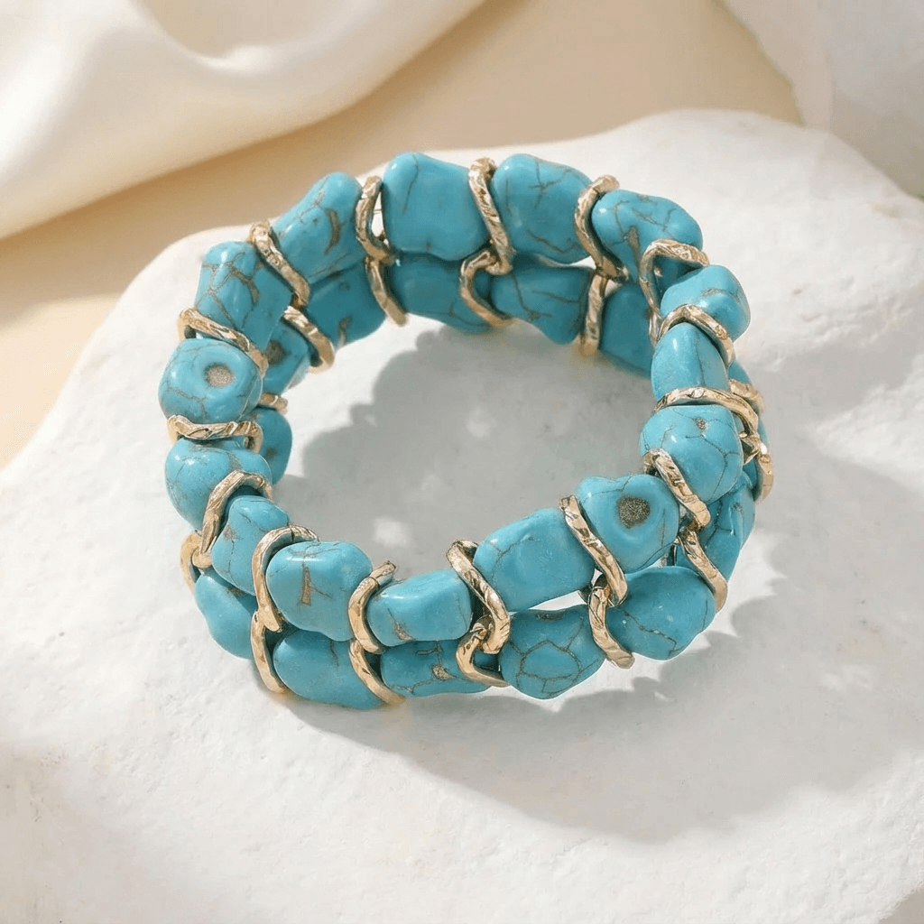Gewebtes goldenes Armband mit Türkis
